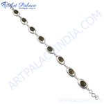 Load image into Gallery viewer, 925 sterling silver chain bracelet featuring oval smoky quartz gemstones, ideal for women.
