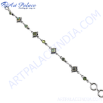 Load image into Gallery viewer, 925 sterling silver peridot bracelet with green gemstones and delicate design.
