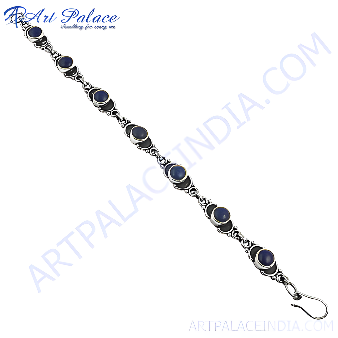Sterling silver bracelet featuring blue gemstones, a beautiful and elegant piece for women.