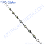 Load image into Gallery viewer, 925 sterling silver chain bracelet with round light green gemstones, perfect for women&#39;s fashion jewelry.
