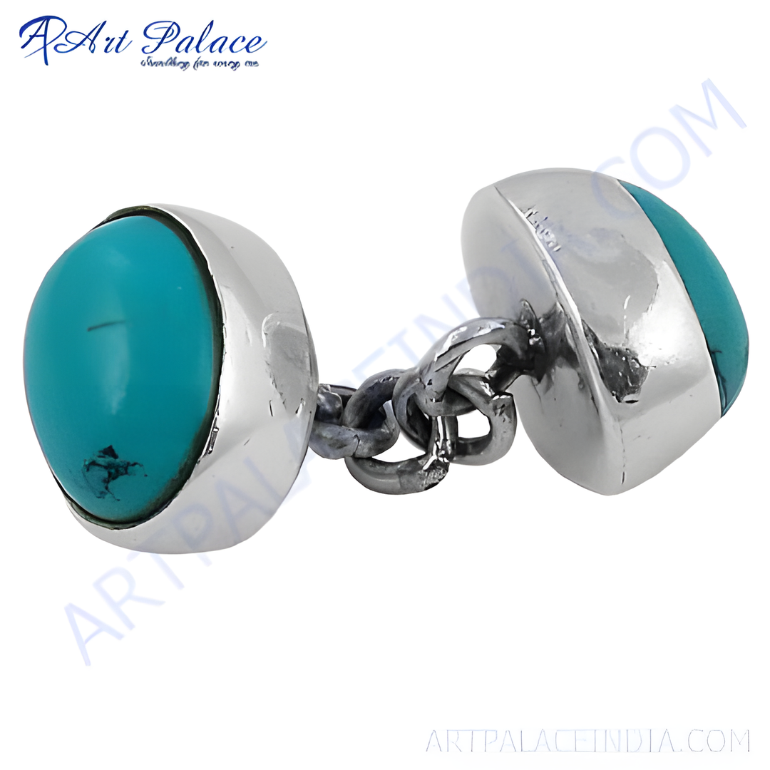 Sterling silver cufflinks with oval turquoise stones and a chain link.