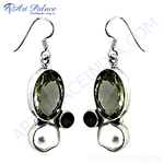 Load image into Gallery viewer, 925 sterling silver drop earrings featuring oval green amethyst gemstones and a smaller accent stone
