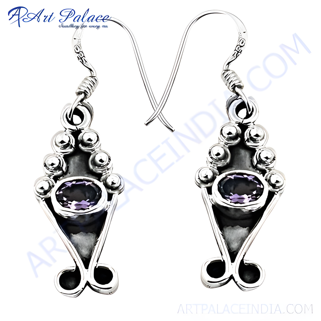 925 sterling silver drop earrings with oval amethyst gemstones and decorative design.