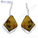 Load image into Gallery viewer, 925 sterling silver dangle earrings with natural amber gemstones, showing warm yellow and brown tones.
