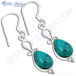 Load image into Gallery viewer, 925 sterling silver turquoise teardrop dangle earrings, perfect for women. Featuring a vibrant blue-green gemstone.
