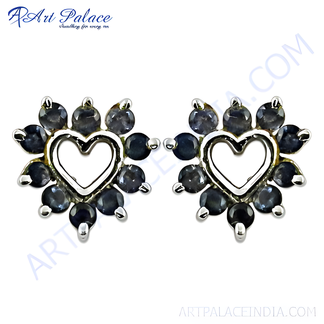 Sterling silver stud earrings with a heart-shaped design and dark blue sapphire gemstones.
