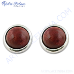 Load image into Gallery viewer, Sterling silver stud earrings with a round red gemstone center, perfect for daily wear.

