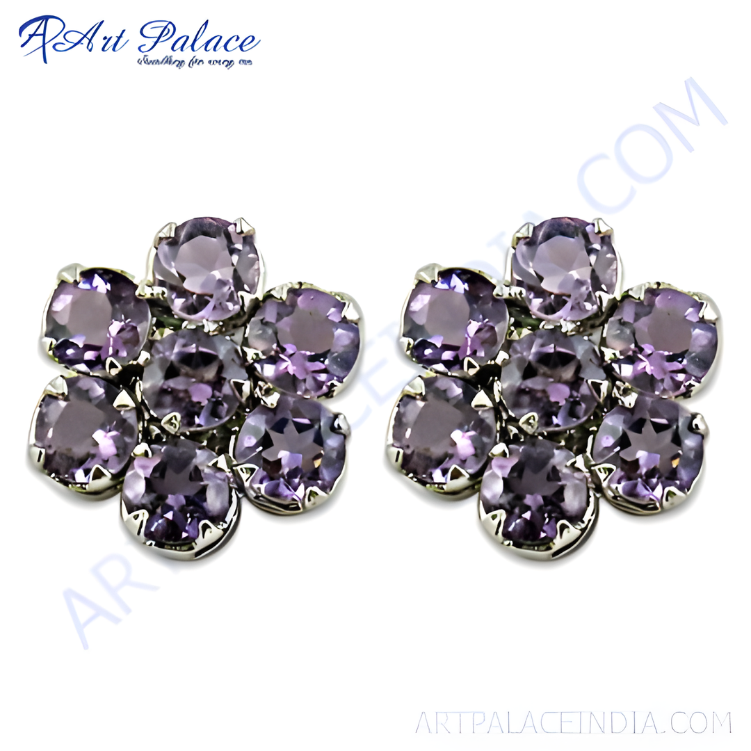 Sterling silver stud earrings featuring a flower design with round purple amethyst gemstones.