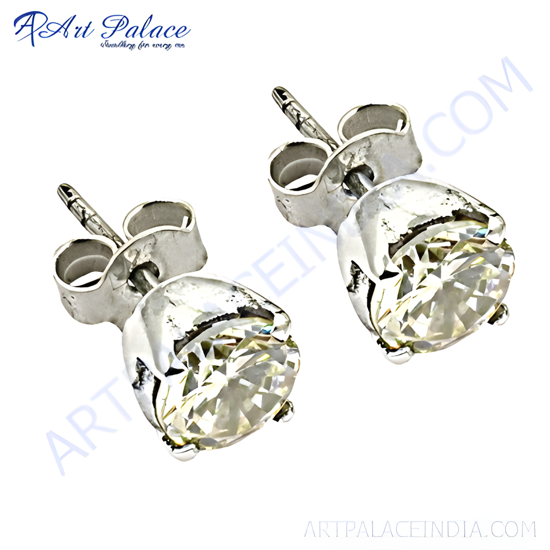 Silver stud earrings with round-cut diamonds, sparkling white gemstone, and a classic design