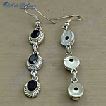 Load image into Gallery viewer, Sterling silver dangle earrings with three black onyx gemstones, perfect for everyday wear.
