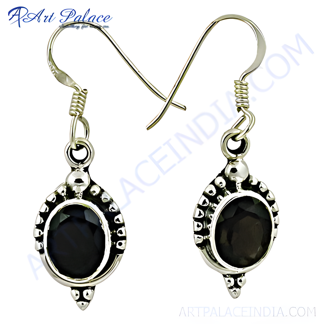 925 sterling silver dangle earrings featuring oval black onyx gemstones. Elegant design for women.