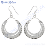Load image into Gallery viewer, Sterling silver hoop earrings, a classic and elegant design, perfect for any occasion.
