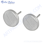 Load image into Gallery viewer, Silver stud earrings with textured surface and post backings, perfect for everyday wear.
