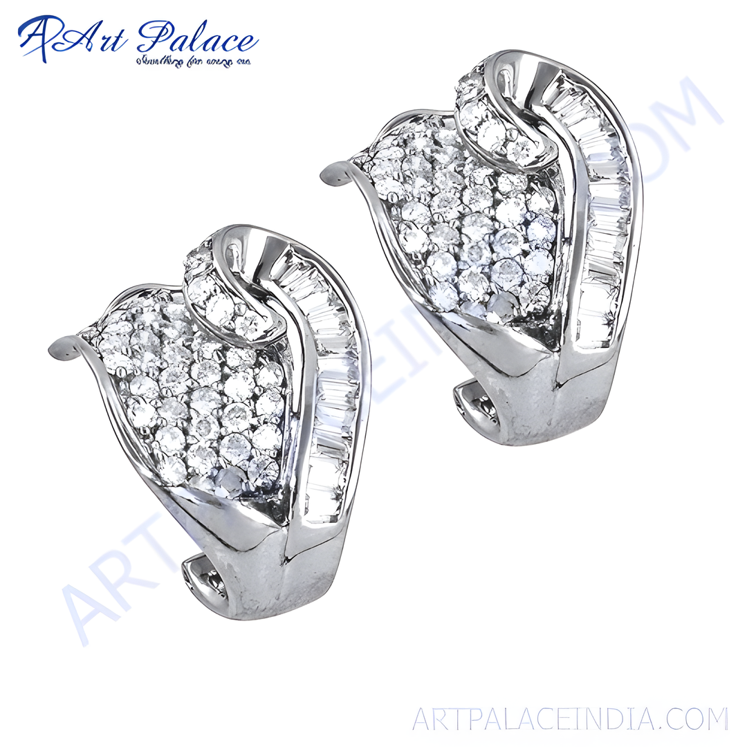 Diamond stud earrings in a heart shape, crafted with diamonds on white background.