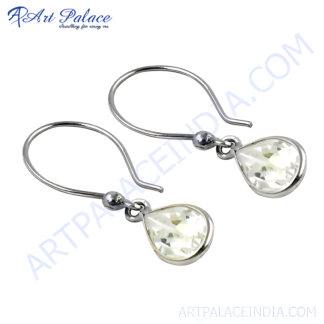 Silver teardrop dangle earrings with gemstone accents. Elegant silver drop earrings for women.