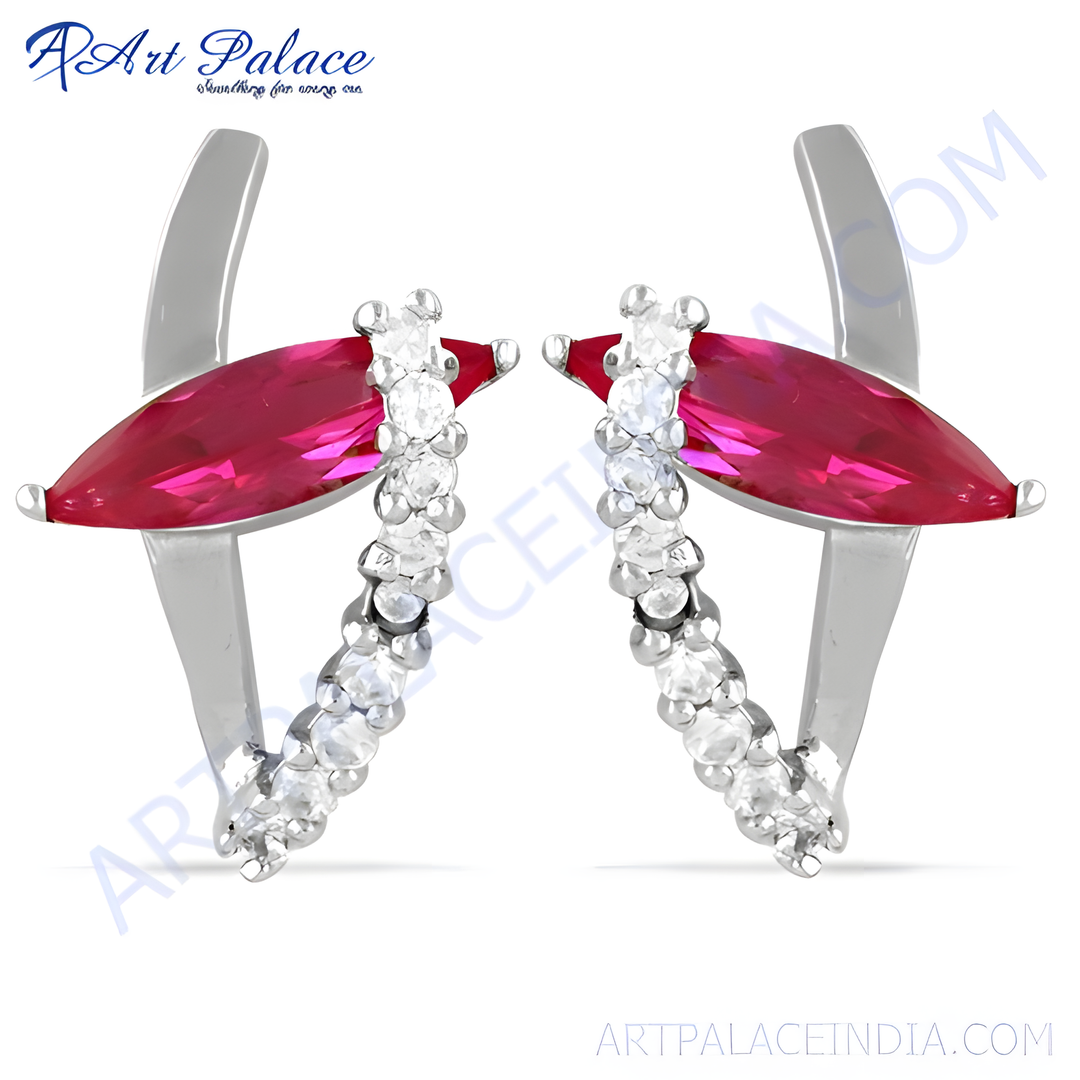 Sterling silver stud earrings with marquise-cut ruby gemstones, a stylish and colorful earring choice for women.