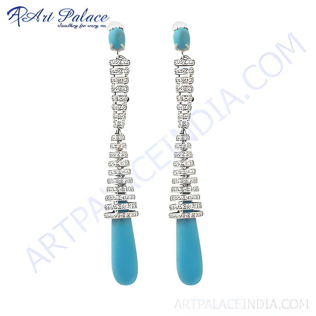 Elegant silver drop earrings featuring turquoise stones, perfect for adding a touch of color and sophistication.