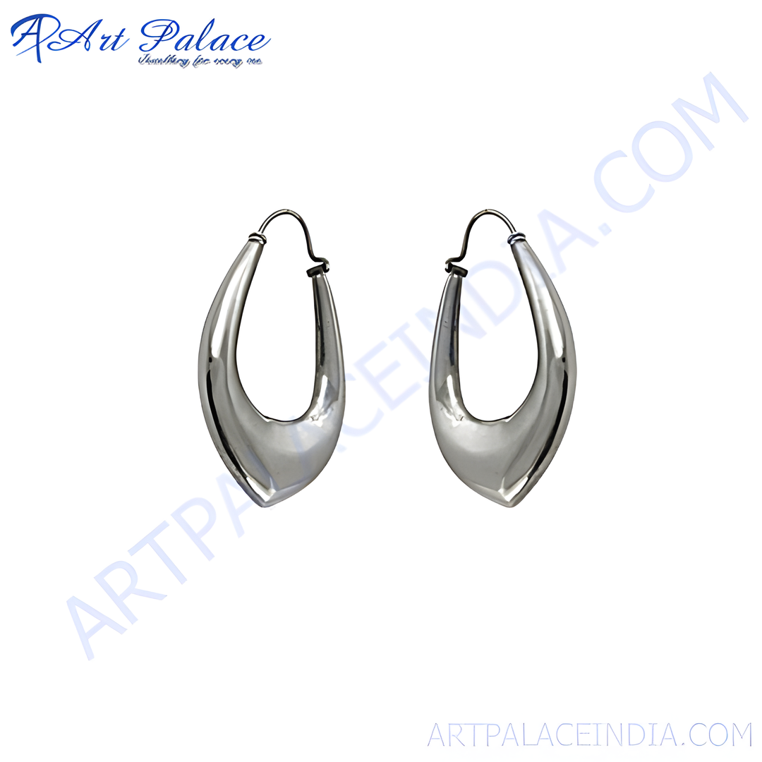 Silver teardrop hoop earrings with a polished finish, ideal for women's fashion jewelry.