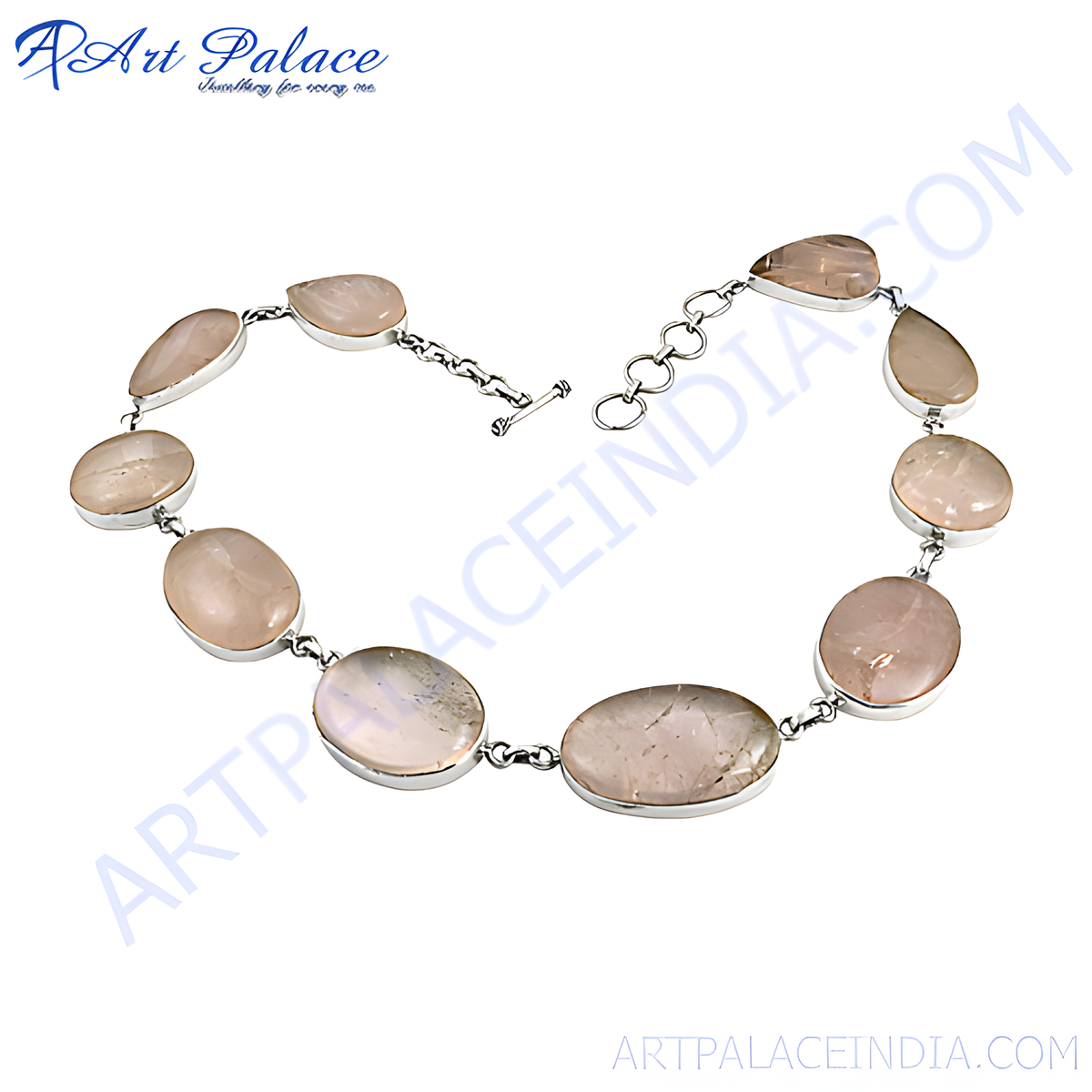Sterling silver bracelet featuring oval and pear shaped rose quartz gemstones