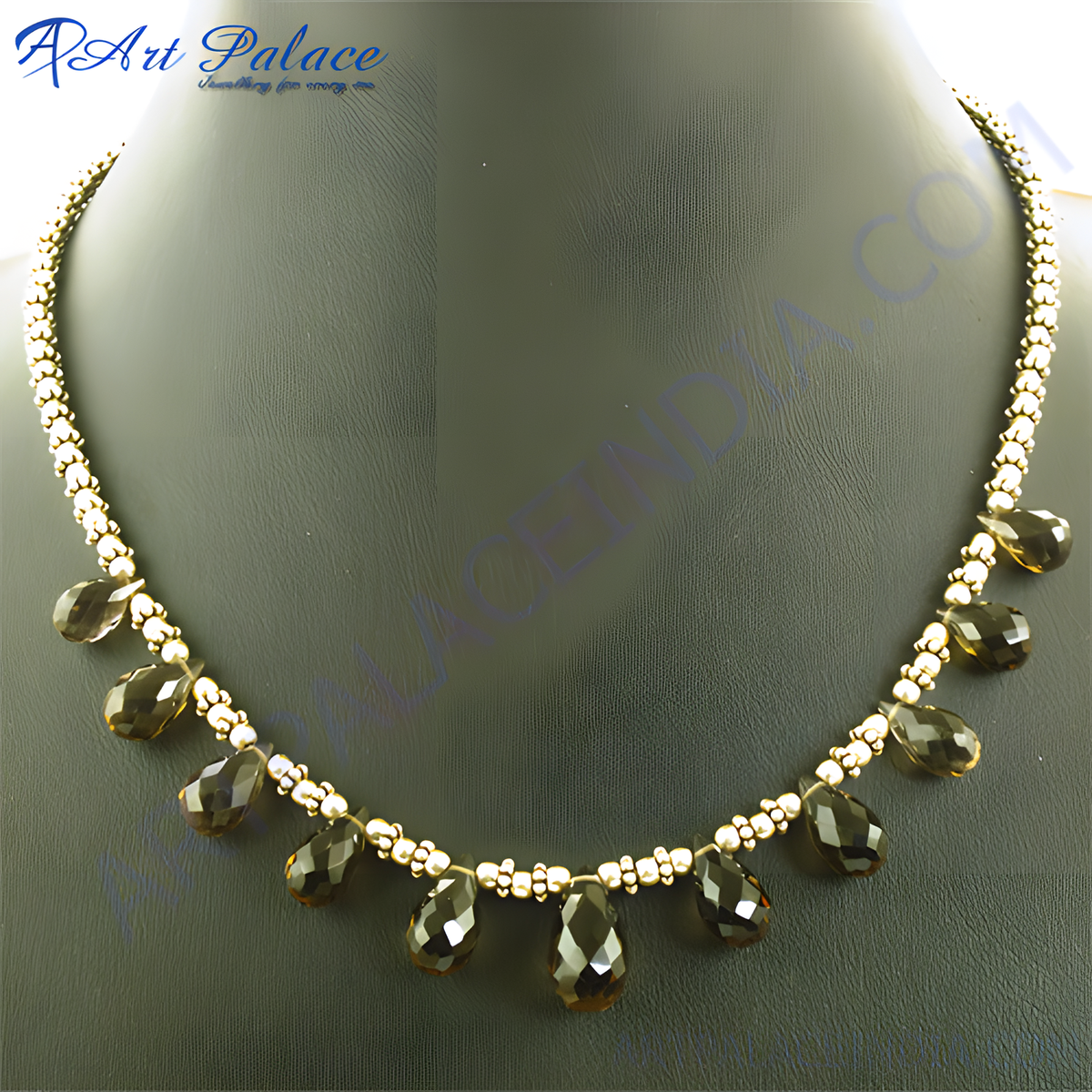 Smoky quartz beaded necklace with gold plating tone accents displayed on a mannequin