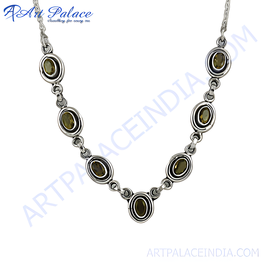 925 sterling silver necklace featuring olive green gemstones in a linked design.