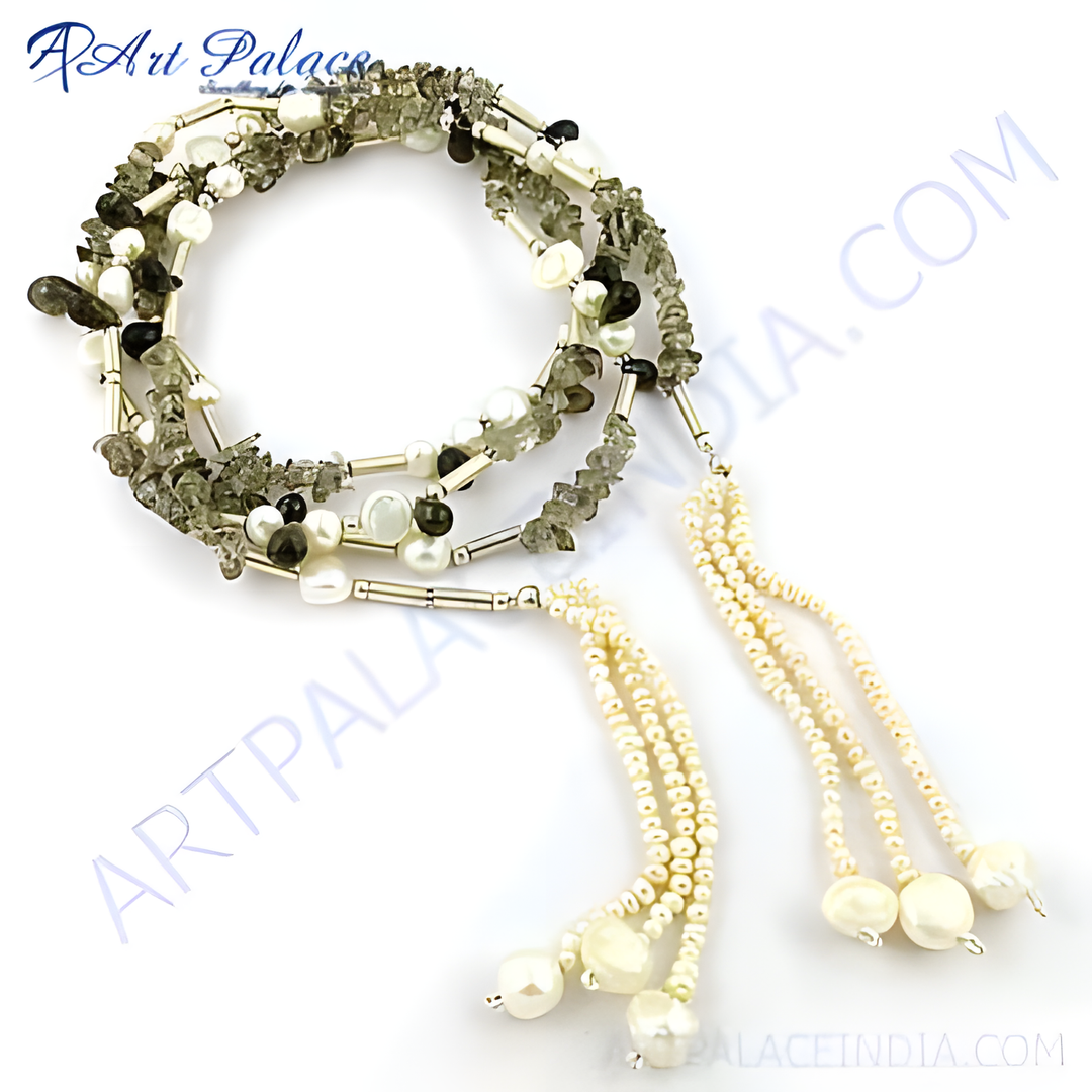 A beautiful pearl and gemstone necklace on a white background, highlighting its unique design.