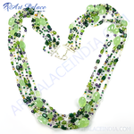 Load image into Gallery viewer, Multi-strand gemstone beaded necklace featuring various shades of green, purple and clear beads.
