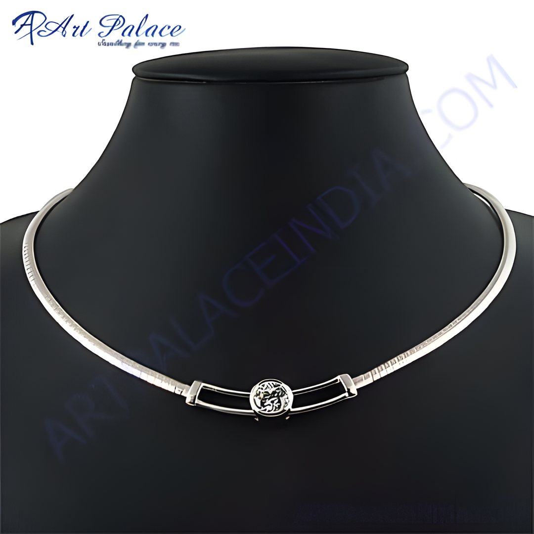 Sterling silver collar necklace on a black mannequin, featuring a central design.