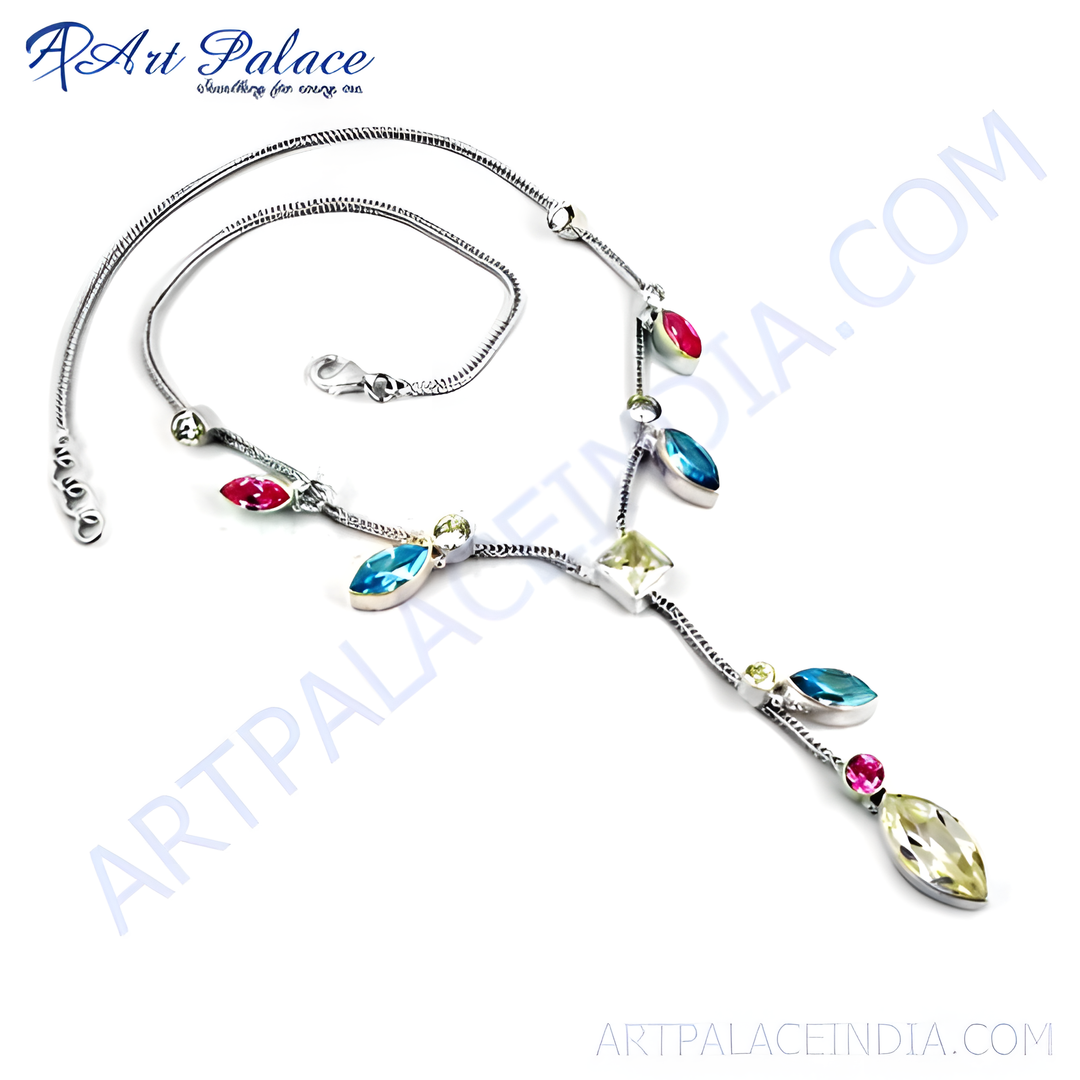 Sterling silver necklace with colorful gemstones; blue, pink, and yellow stones on a delicate silver chain