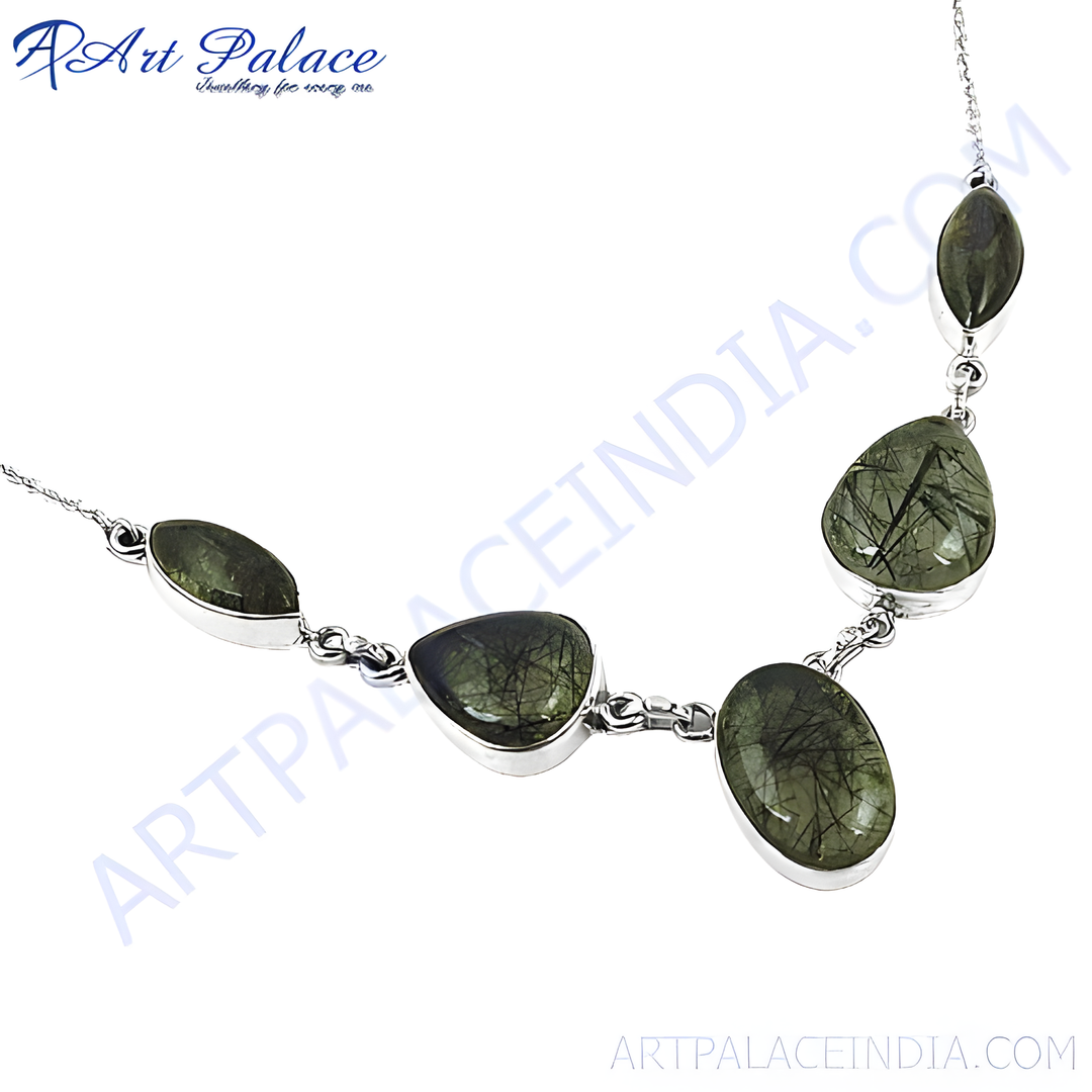 Sterling silver necklace with oval and teardrop-shaped rutilated quartz stones in a bezel setting.