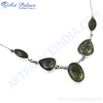 Load image into Gallery viewer, Sterling silver necklace with oval and teardrop-shaped rutilated quartz stones in a bezel setting.

