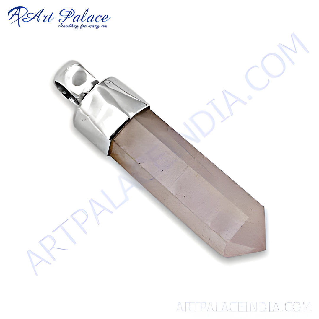Silver pendant with a rose quartz crystal. Elegant and timeless design for women.