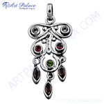 Load image into Gallery viewer, 925 sterling silver charm pendant featuring garnet gemstones in a unique design.
