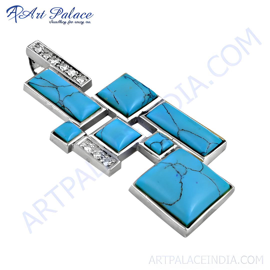 Sterling silver pendant necklace with turquoise gemstones in a unique geometric design.
