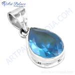 Load image into Gallery viewer, 925 sterling silver teardrop pendant with a brilliant blue topaz gemstone. A beautiful piece of women&#39;s jewelry.
