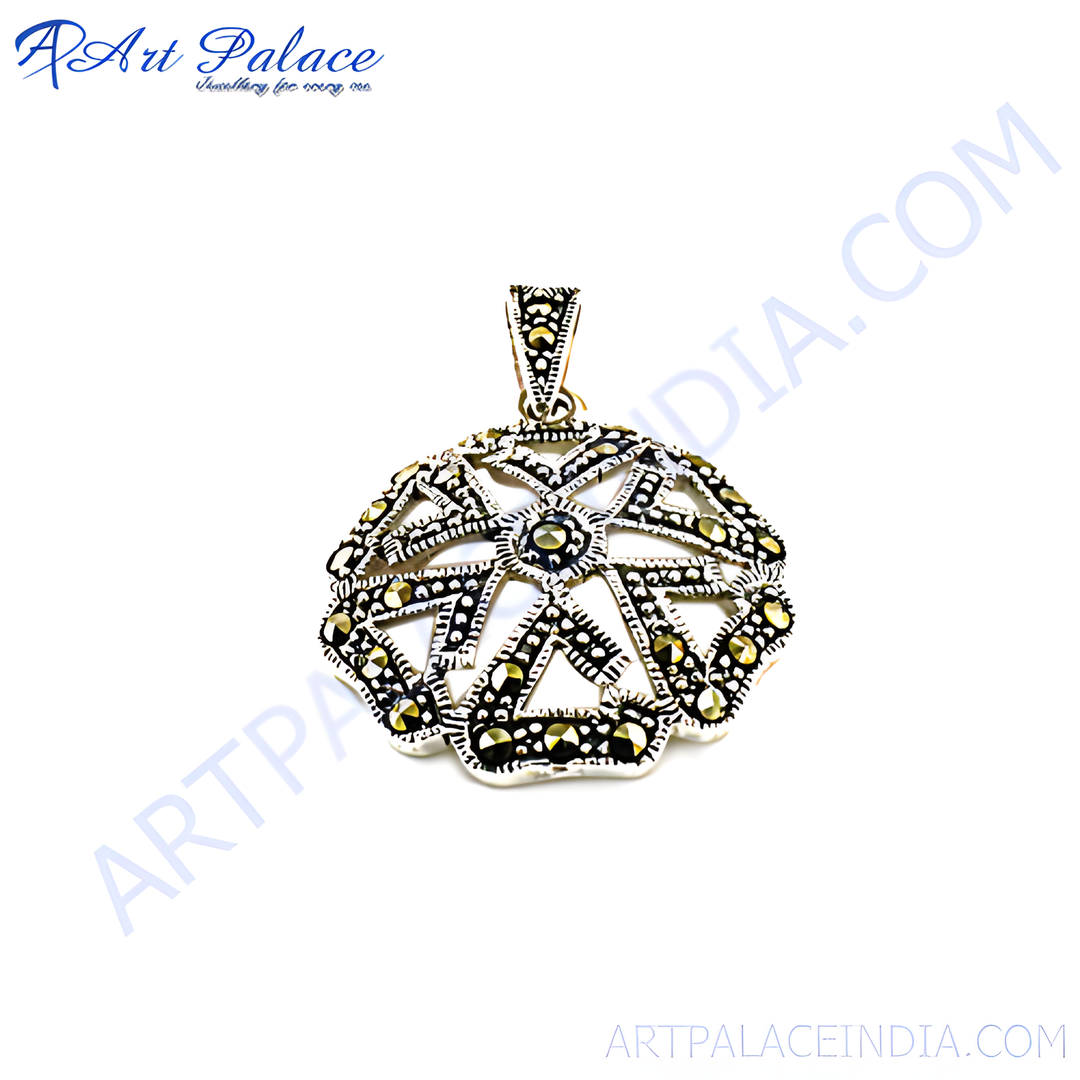 Sterling silver marcasite pendant with intricate geometric design and sparkling stones.