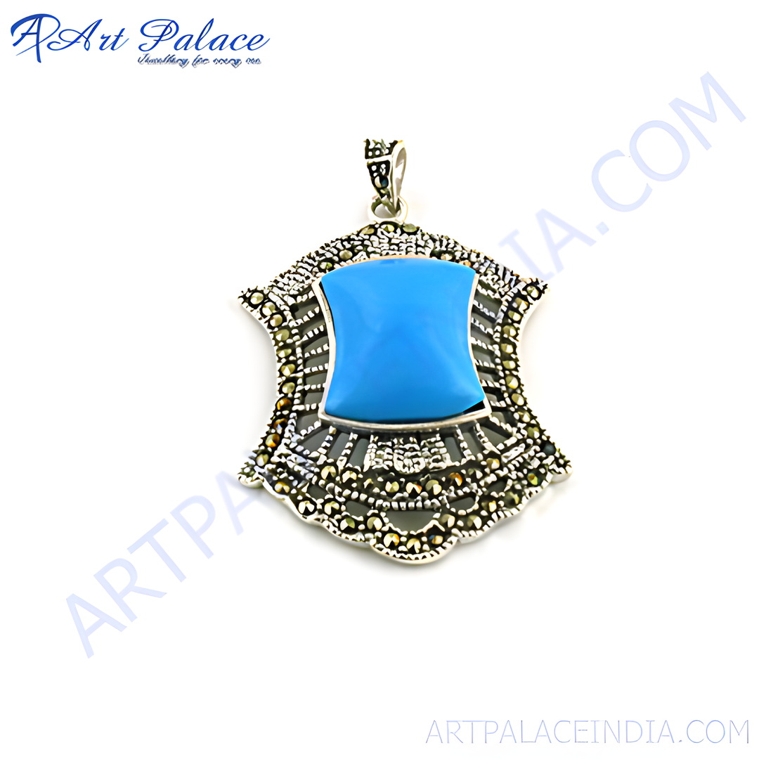 925 sterling silver pendant with a turquoise gemstone center and marcasite accents.