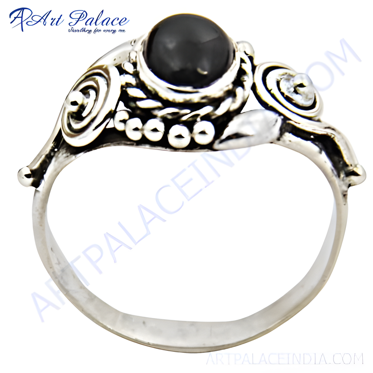Sterling silver ring featuring a round black onyx gemstone set in a detailed design