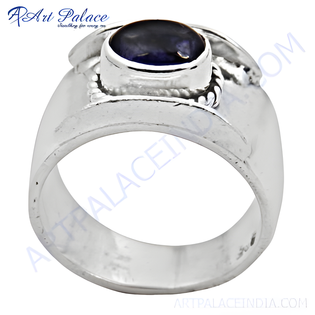 Sterling silver ring with a large oval-shaped blue gemstone. A statement piece for women.
