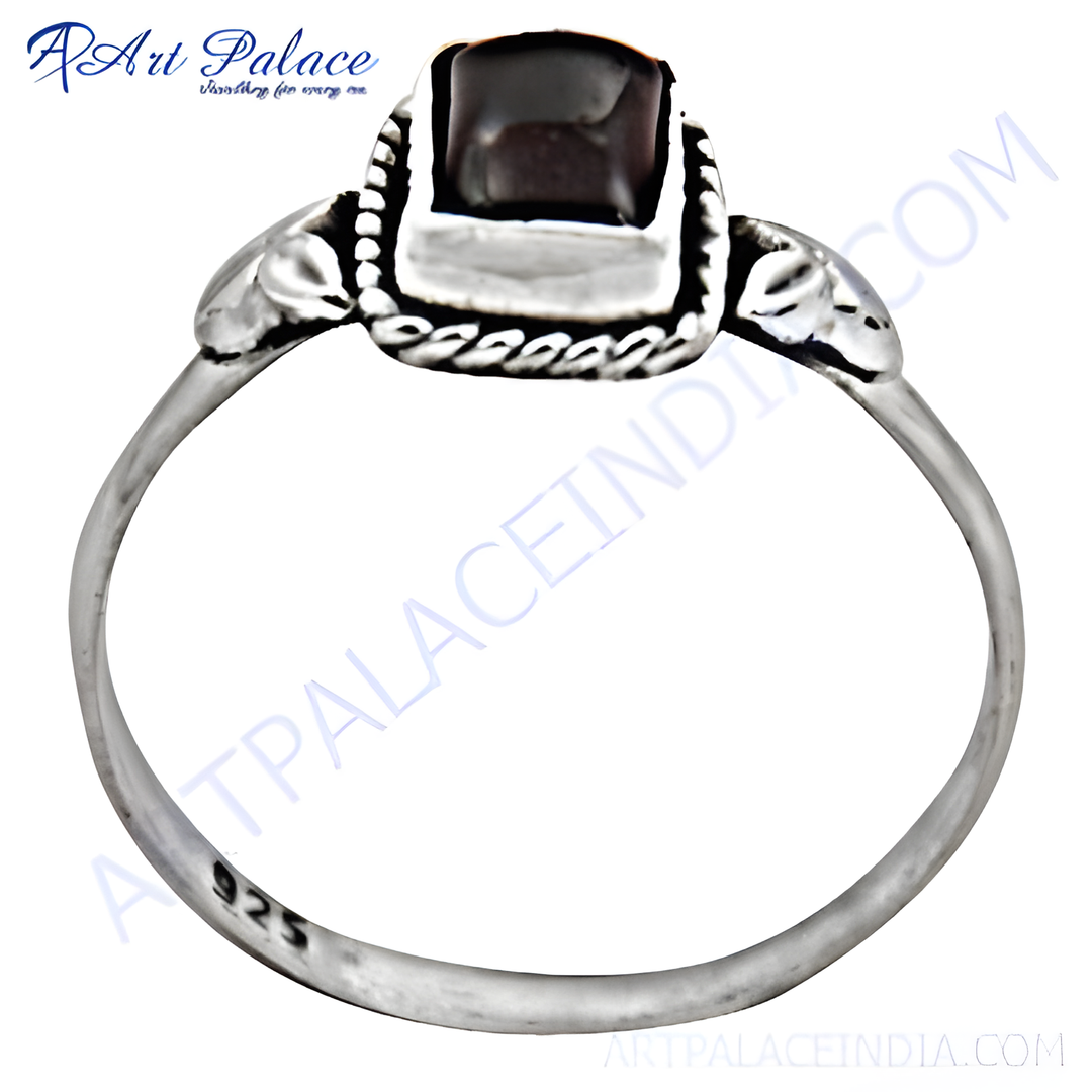 925 sterling silver ring with a square-cut garnet gemstone.