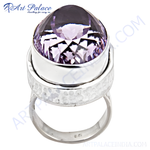 Load image into Gallery viewer, Sterling silver ring with a large, faceted purple amethyst gemstone. A beautiful statement piece.
