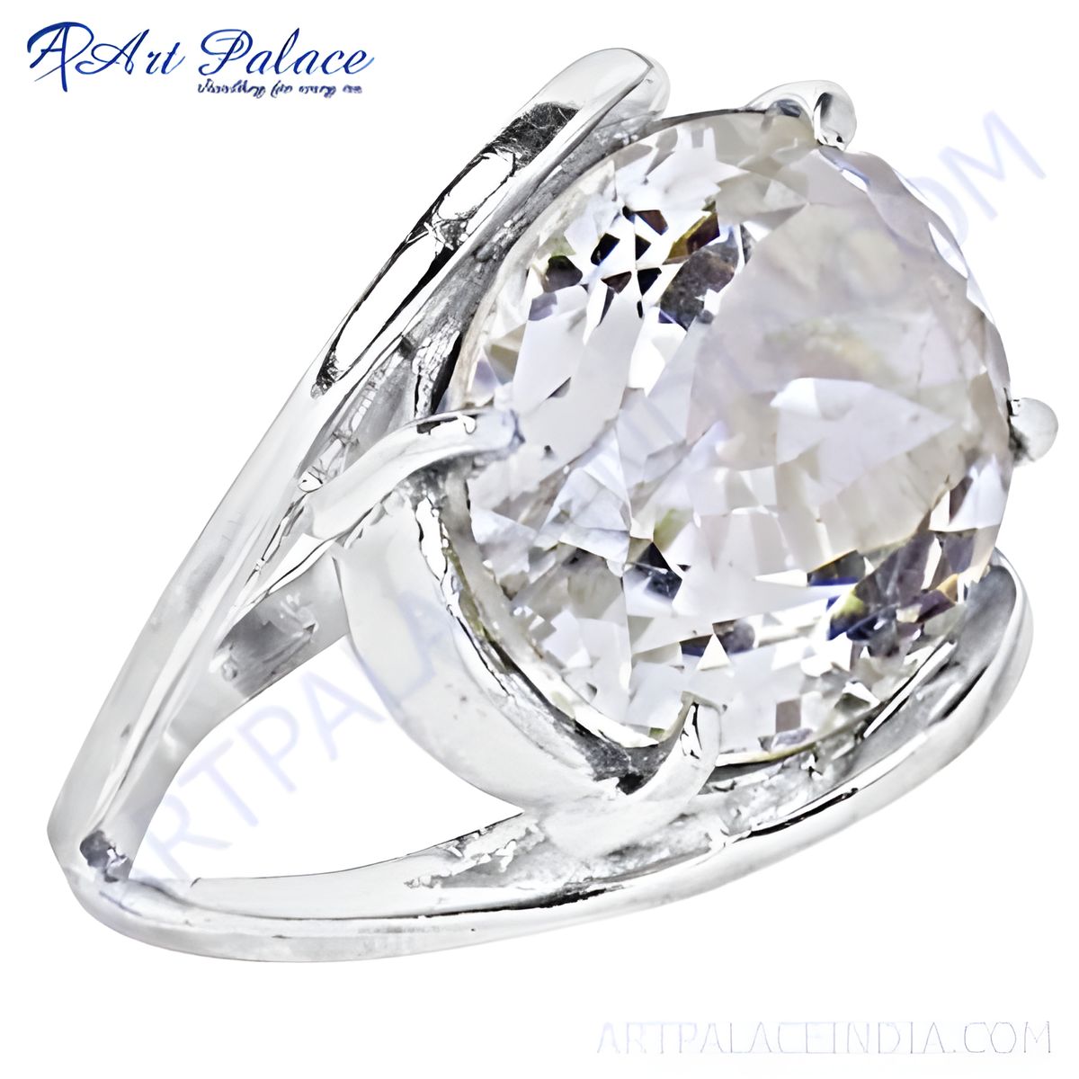 Close up of a silver ring with a large, faceted white gemstone, sparkling and reflective