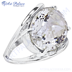 Load image into Gallery viewer, Close-up of a silver ring with a large, faceted white gemstone, sparkling and reflective.
