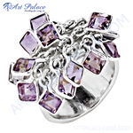 Load image into Gallery viewer, Sterling silver cluster ring with square-cut purple amethyst gemstones, a striking piece of gemstone jewelry.
