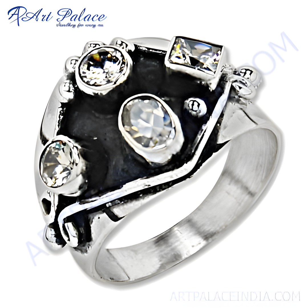Sterling silver gemstone ring with black enamel detailing and multiple white gemstones.