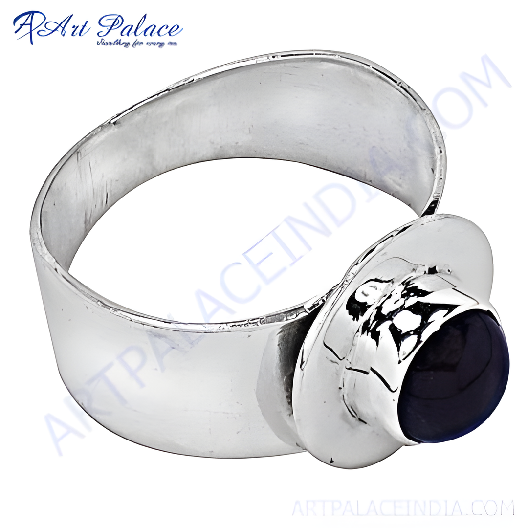 Sterling silver ring featuring a large oval black onyx gemstone.