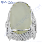 Load image into Gallery viewer, Sterling silver ring with a large, oval-shaped pale green gemstone. Modern design for women.
