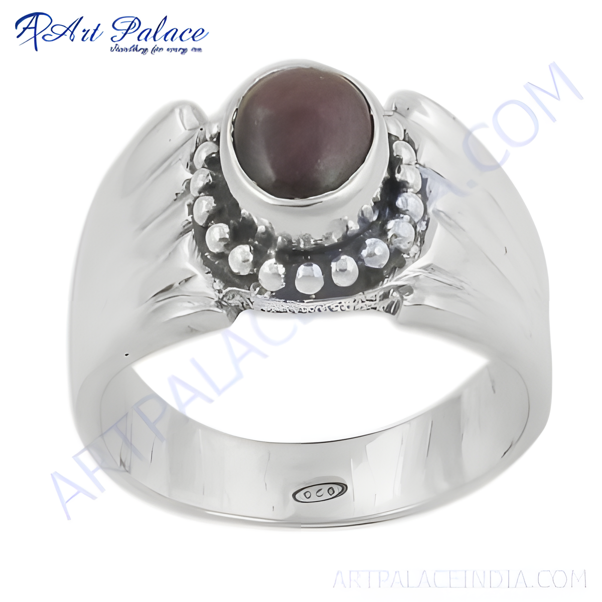 Sterling silver ring with a dark gemstone, showcasing the ring's intricate details and polished finish