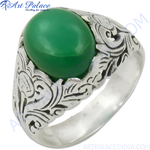 Load image into Gallery viewer, Sterling silver ring with a large oval green gemstone, intricate details on the band, perfect for men&#39;s fashion.
