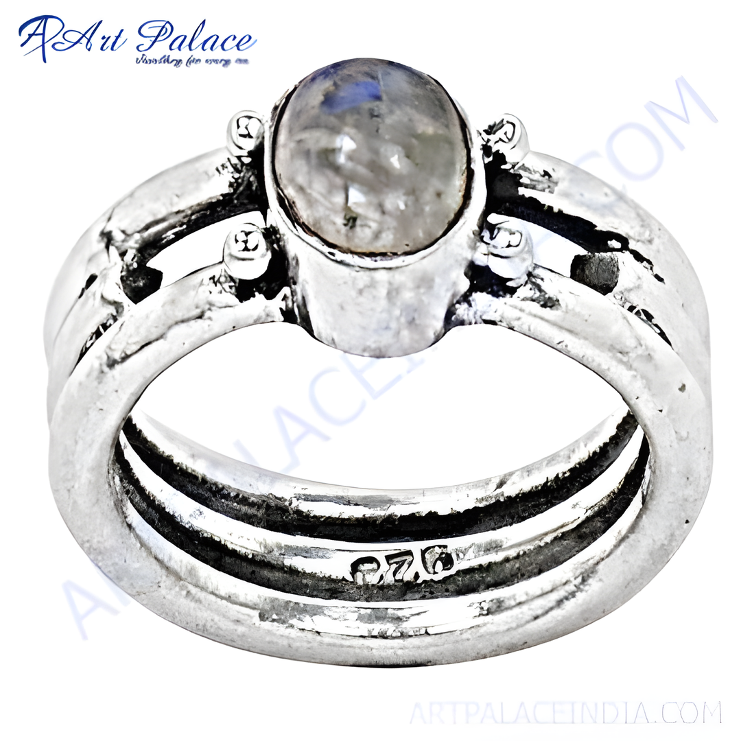 Sterling silver moonstone ring with a round, iridescent gemstone, ideal for women's jewelry.